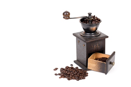 manual coffee grinder and coffee bean on white backgroundの写真素材