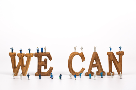 miniature people with text WE CANの写真素材