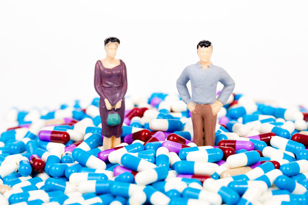 miniature people with drug capsuleの写真素材