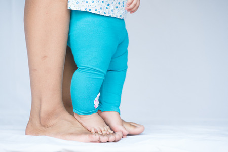 mother and toddler on white backgroundの写真素材