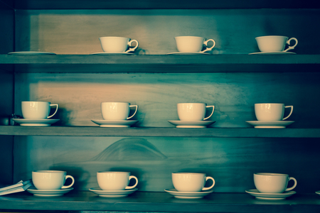 row of white coffee cupの写真素材