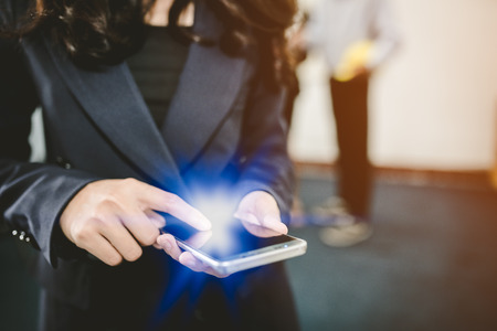 business womanman use smartphone in office