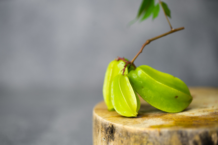 starfruit on cutting boardの写真素材