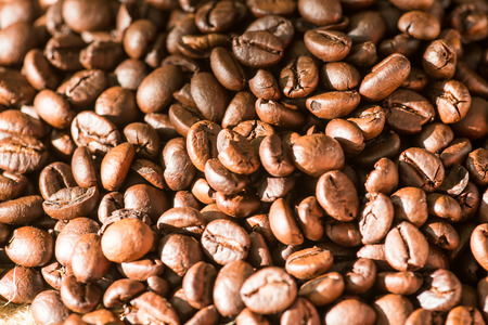 coffee bean on sackcloth with dark backgroundの写真素材