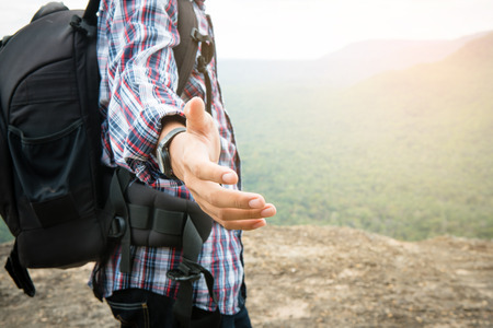 tourist hold helping hand