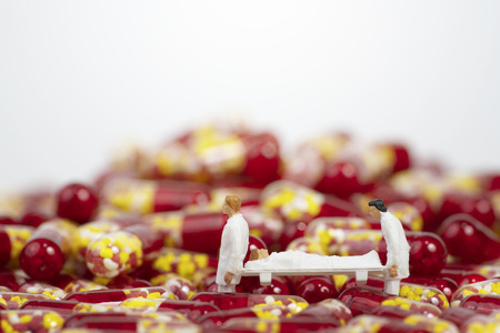 Miniature people with medical drug capsuleの写真素材
