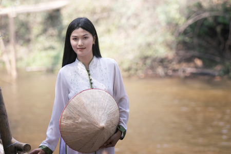 woman with Vietnam culture traditional dress, Ao dai 