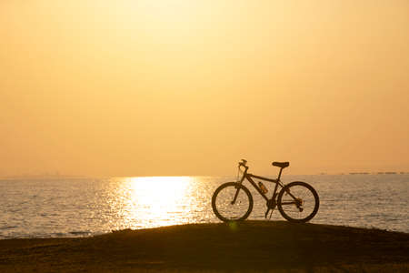 silhouette of bicycle at the sunset in countrysideの写真素材