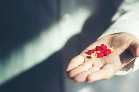 close up medical pill on hand