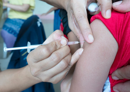 Doctor making vaccination to patient, Flu Vaccine , coronavirus, covid-19 vaccineの写真素材