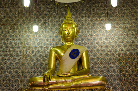 golden buddha statue image in temple Thailandのeditorial素材