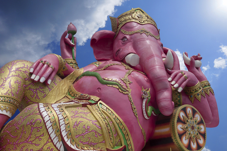Pink Genesha,Ganesha,the elephant deity riding a mouse,Lord of Success,prime Hindu deities, Blue sky and cloud, sunlight effect on the right side of picture ,samanrattanaram temple: Chachoengsao Thailandの写真素材