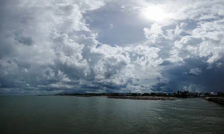 panorama view of the sea with rainy cloud and sun, prachuapkhirikhan province ,thailand