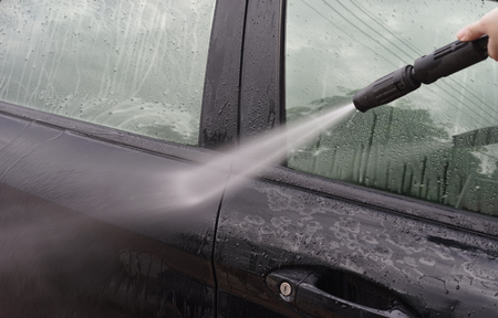 Car Washing. Cleaning Car Using High Pressure Water by woman,woman can wash,woman can doの写真素材