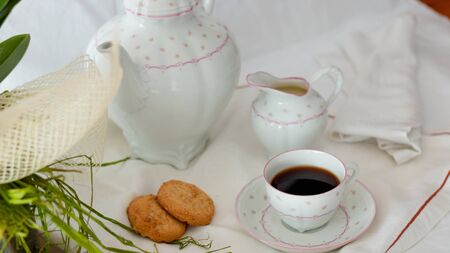 coffee with cookies on the tableの写真素材