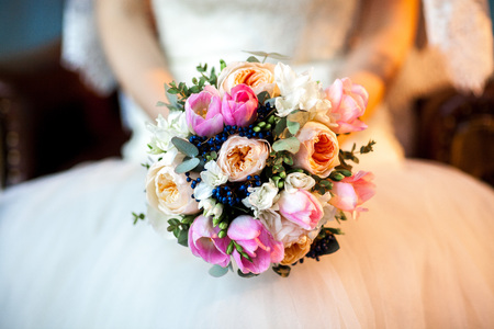 Bride holding beautiful wedding flowers bouquetの写真素材