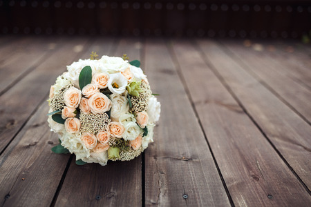 Wedding bouquet on a wooden backgroundの写真素材