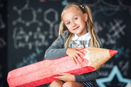 . School Girl responds to the lesson. Back to school!の写真素材