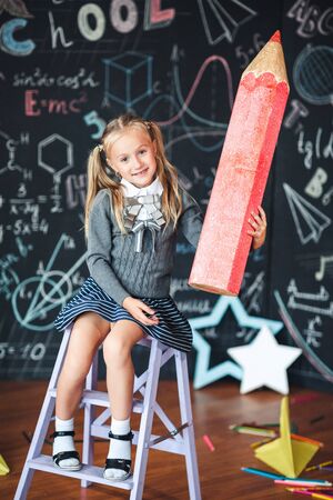 . School Girl responds to the lesson. Back to school!の写真素材