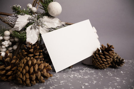 Christmas decoration with blank card on grey background. Copy space for your text.の写真素材