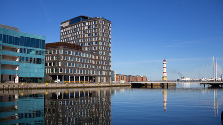 Illustration of modern office building with business facade near sea canal in urban city, reflecting corporate and architectural designの写真素材