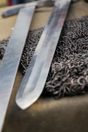 Medieval chainmail armour and sword, text spaceの写真素材