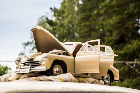 very beautiful old car with an inside view at the festival of vintage cars