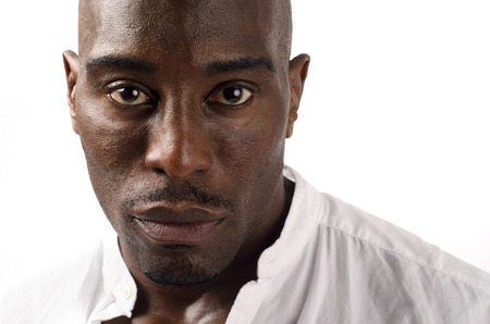 Portrait of a black man wearing a white shirt, beautiful black man modelの写真素材