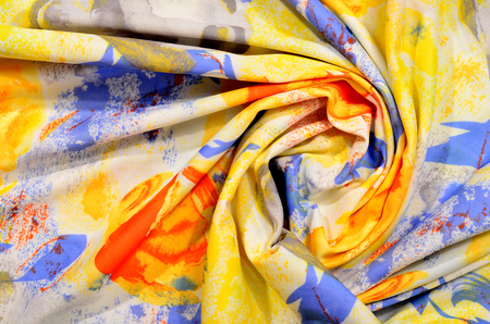 Graphic orange and grey roses print on folded background.の写真素材