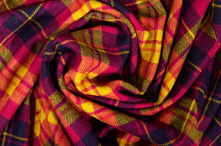 Colored lines and square pattern. Scottish checked fabric crumpled.の写真素材