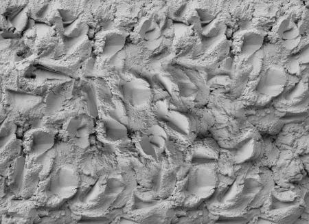 Textured plaster wall (background surface) 