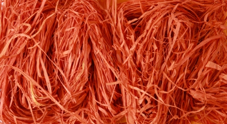 Abstract background texture, natural orange raffia. Vintage luxurious paper or grunge wallpaper 