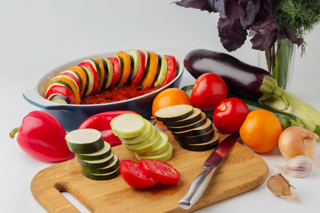Vegetables for Ratatouille - eggplant, zucchini, tomatoes, peppers, garlic, onion. Selective focus.の写真素材