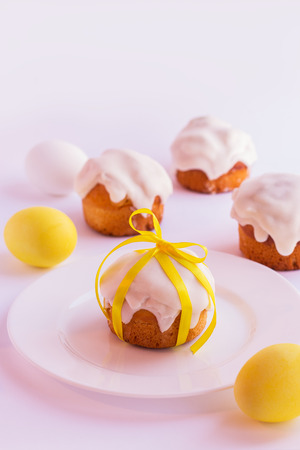 Easter cake and easter eggs on a white background. Selective focus.