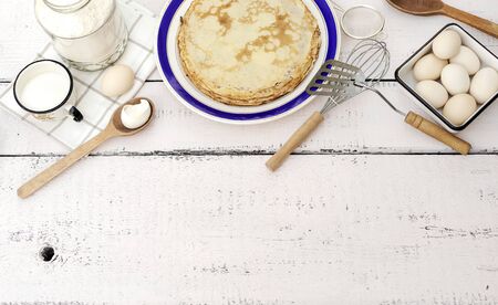 Cooking pancakes. Ingredients, crockery and kitchenware for pancakes. Selective focus.の写真素材