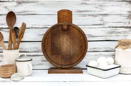 Vintage old baking utensils on a white woodenの写真素材