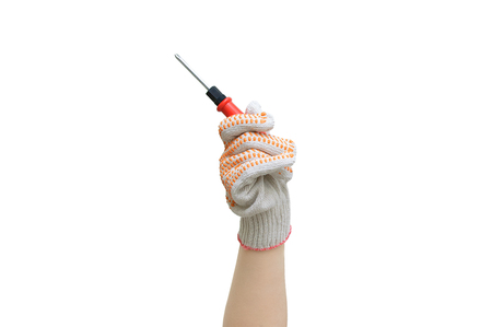 Home repair. Hand with a screwdriver in a protective cotton glove. White isolate