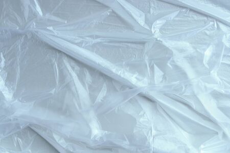 Cellophane transparent film close-up. Covering material for construction.の写真素材