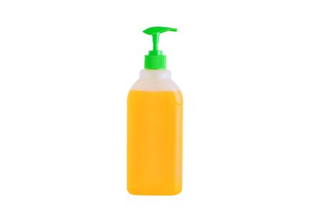 Close-up plastic translucent bottle dispenser with soap. White isolate.の写真素材
