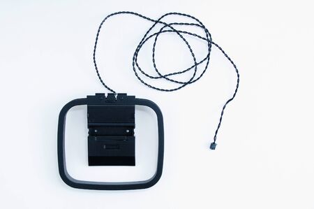 Black plastic antenna with a wire for the player on a white background.
