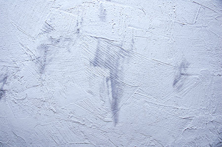 The texture of a plastered gray wall. Decorative plaster.の写真素材