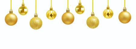 Golden Christmas balls on a ribbon. White background. Banner for the site.の写真素材
