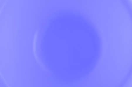 Blurred blue background with a round dent in the center.の写真素材