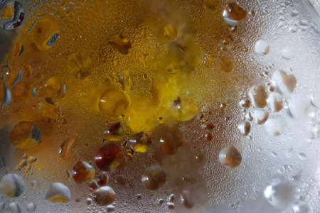 abstract background. Water drops on a yellow white background.