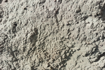 Background texture of a pile of sand. Gray colour.の写真素材