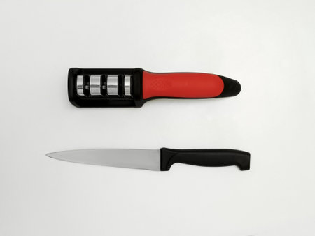 Hand knife and knife. White background. View from above.