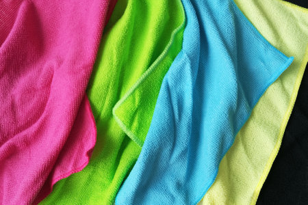Texture of multi-colored cleaning rags close-up.の写真素材