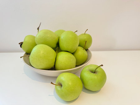 Green apples are slightly more sour than red apples.の写真素材