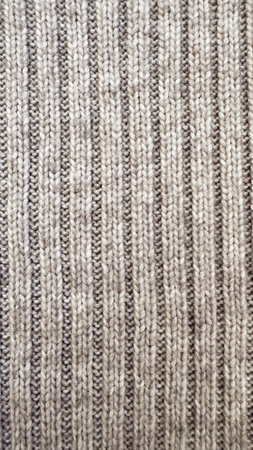 Close-up macro of gray sweater fabric fibersの写真素材