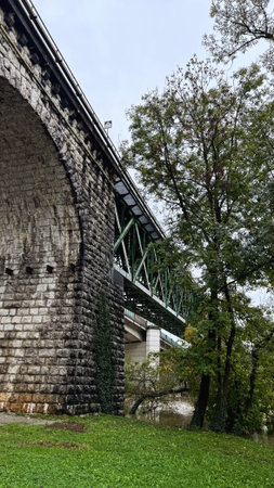 old railway bridge over the Krka river in the town of Novo Mesto Slovenia